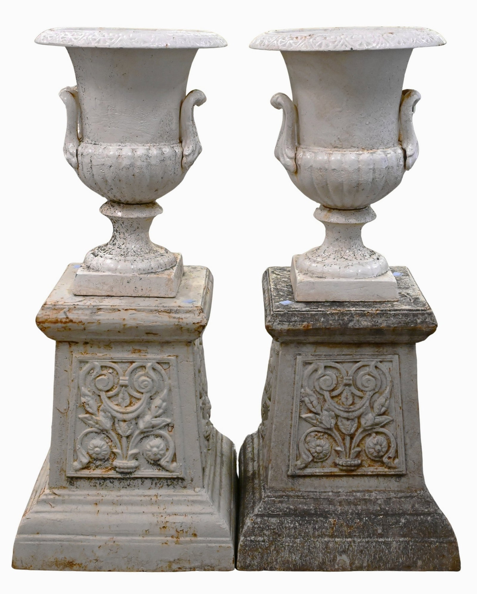 Pair of Outdoor Cast Iron Urns and Pedestals: Pair of Outdoor Cast Iron Urns and Pedestals overall height 33 1/2 inches, urn height 16 1/2 inches, base 14" x 14", diameter 12 inches