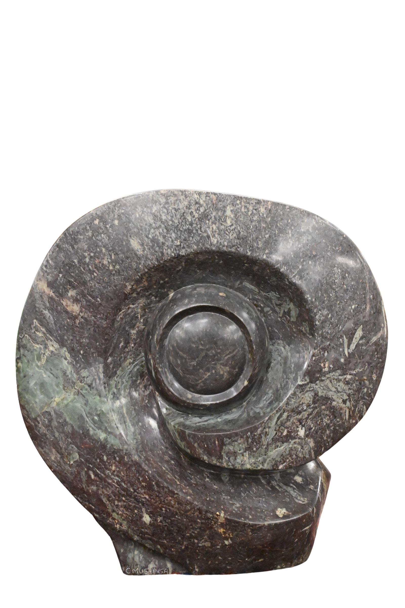 C. Mushinga (Zimbabwe 20th/21st Century): C. Mushinga (Zimbabwe 20th/21st Century) Dual Sided Form Carved stone dual sided sculpture of an eye to one side and a human figure to other Signed C. Mushinga Signed 23 inches, width 23 inches, depth