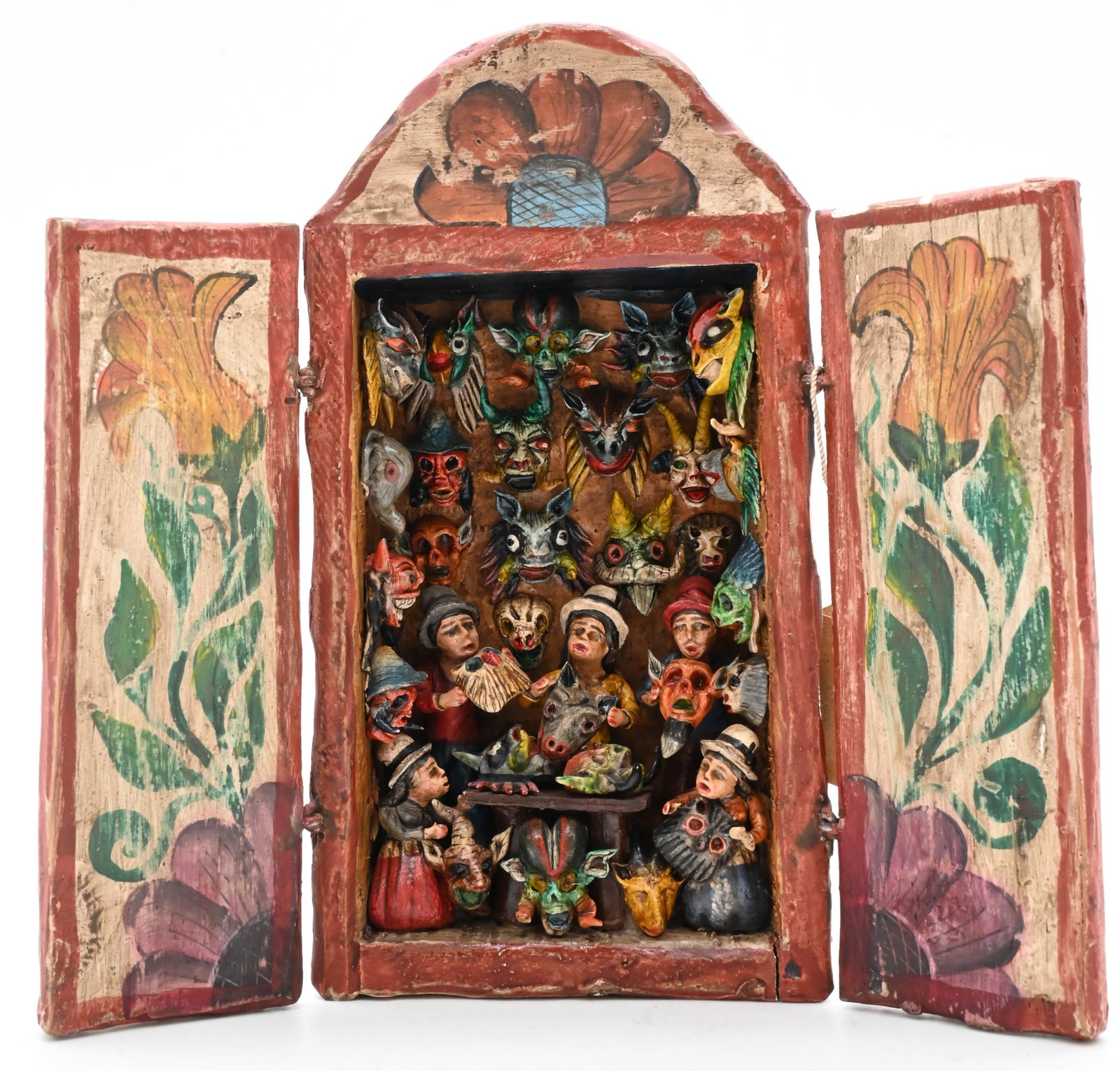 Mabilon and Eleudora Jimenez (Peruvian 20th/21st Century): Mabilon and Eleudora Jimenez (Peruvian 20th/21st Century) "Tienda de Mascaras Retablo" Painted plaster and wood Signed verso 7 1/2" x 8" open Provenance: Property from a Park Avenue New York City