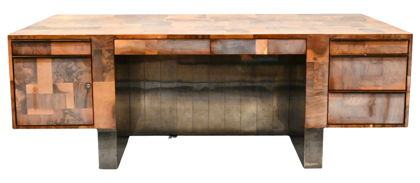 Paul Evans Studio for Directional Cityscape Executive Desk: Paul Evans Studio for Directional Cityscape Executive Desk Walnut and maple burl desk having patinated steel facade panels in the Cityscape pattern, the case over seven drawers. height 29 3/4 inches, 
