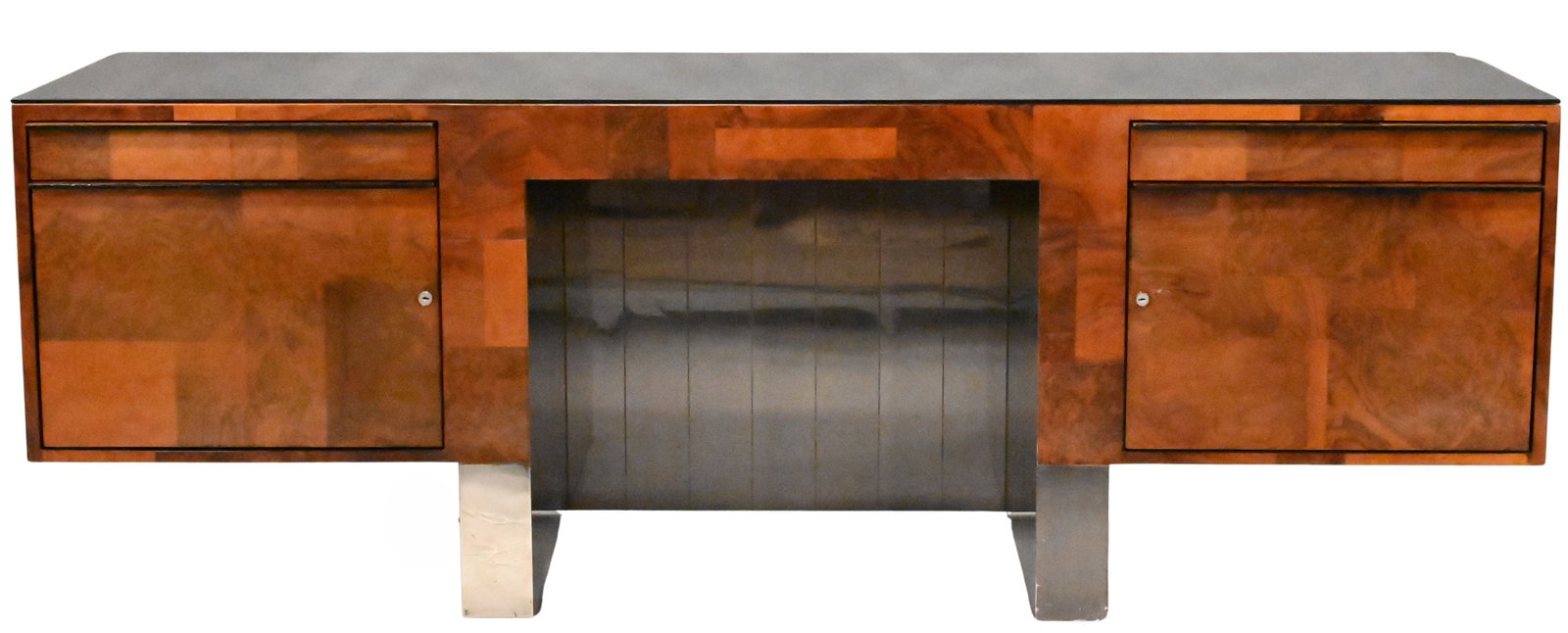 Paul Evans Studio for Directional Cityscape Desk: Paul Evans Studio for Directional Cityscape Desk Walnut and maple burl desk having patinated steel facade panels in the Cityscape pattern, the case over four drawers. height 29 3/4 inches, width 84 in