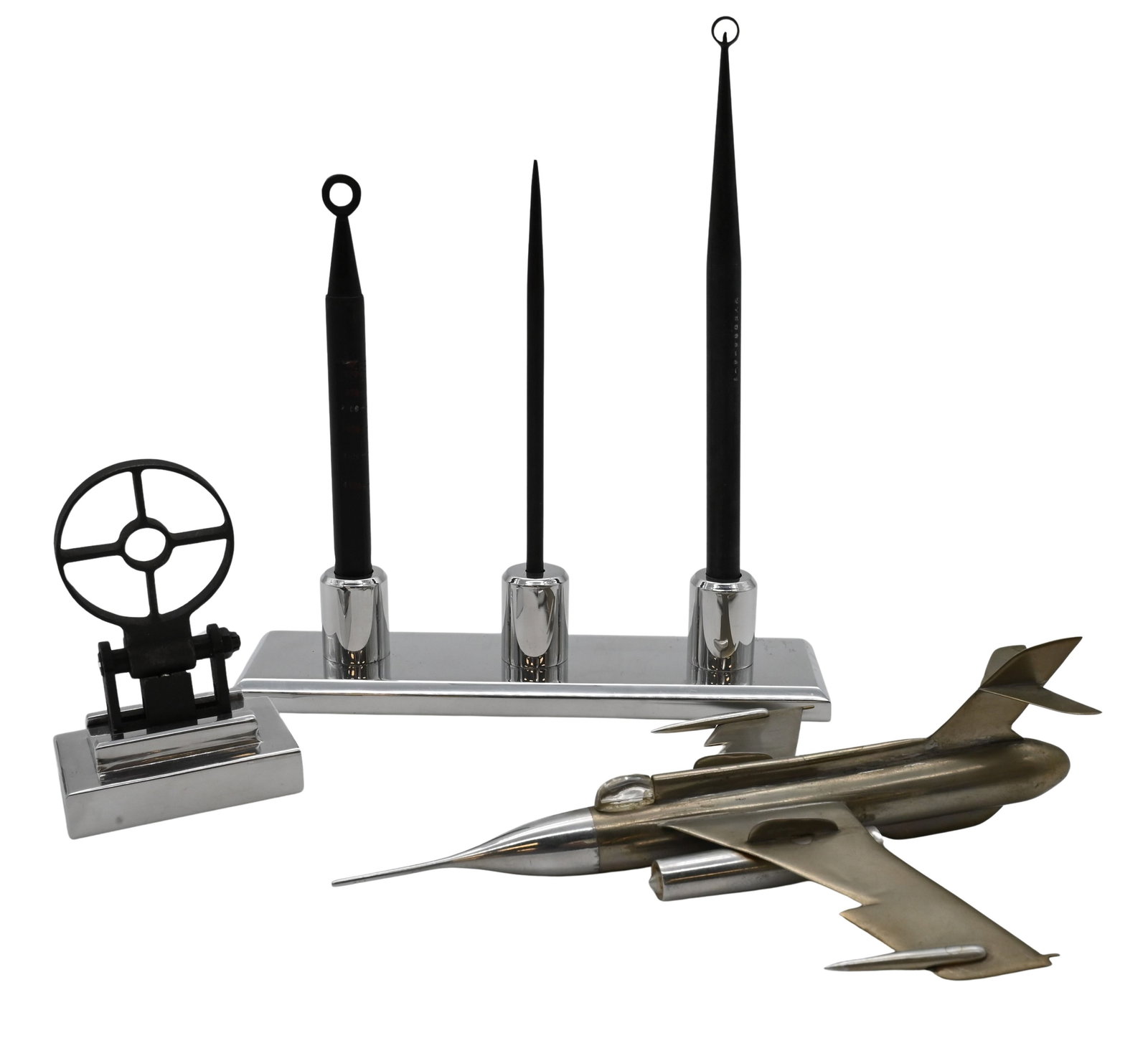 Group of Aviation and Naval Optical Accessories: Group of Aviation and Naval Optical Accessories Comprising a cast metal jet airplane model together with a chrome-mounted group of naval optical sights or targeting scopes, along with a small optical 