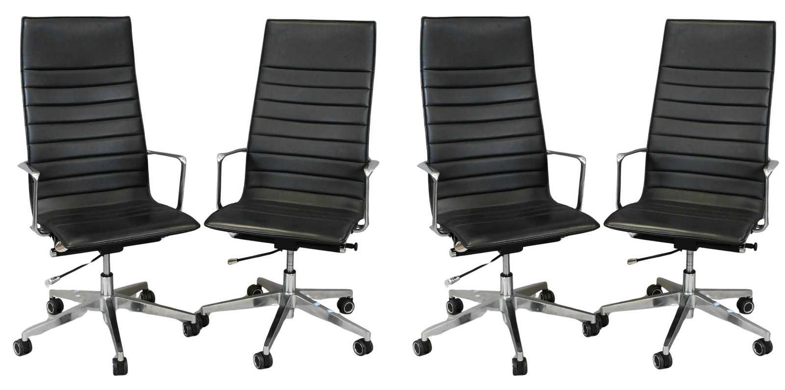 Two Pairs of Eames Style Leather and Chrome Office Chairs: Two Pairs of Eames Style Leather and Chrome Office Chairs each set on large casters height 45 inches, width 25 inches