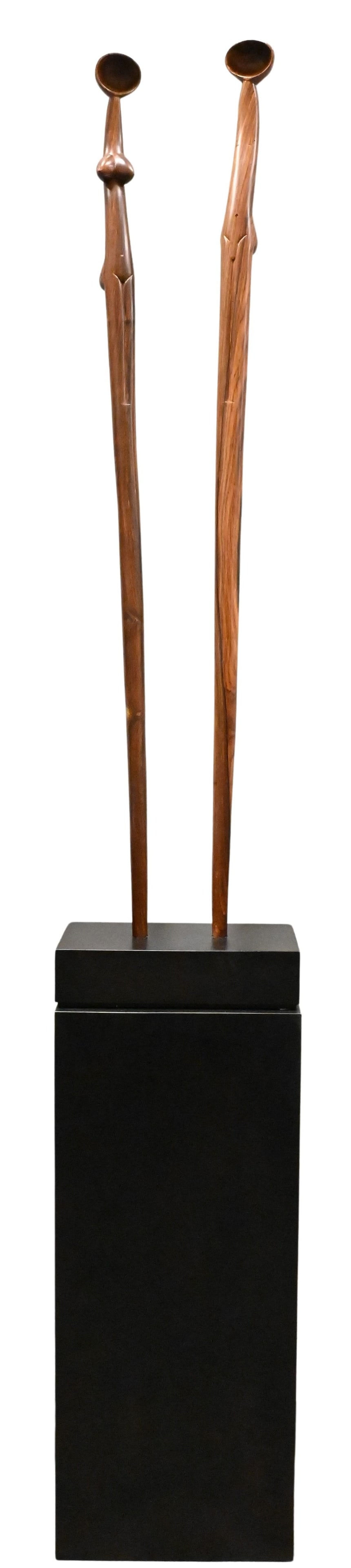 Pair of Indigenous South American Figural Ceremonial Staffs: Pair of Indigenous South American Figural Ceremonial Staffs folk art carved cocobolo hardwood staffs depicting male and female figures, executed in the traditional style of the Wounaan culture of the 