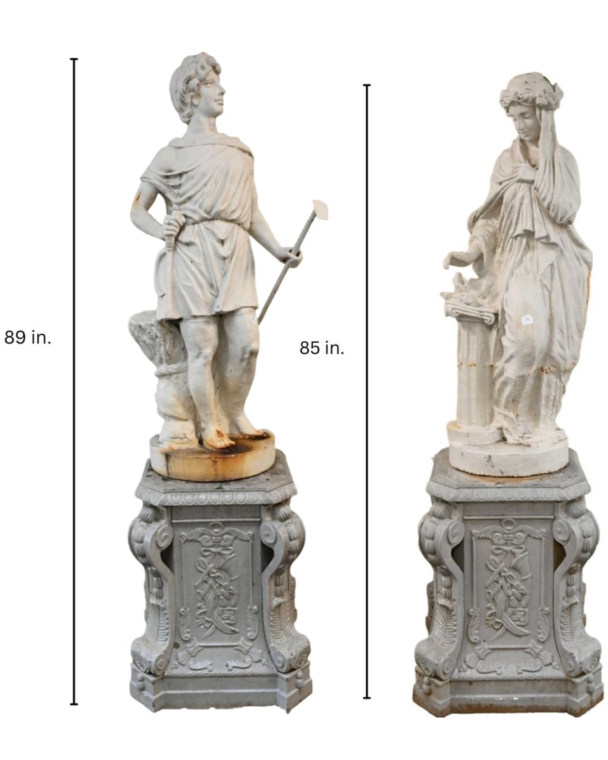 Pair of Iron Outdoor Neoclassical Figures Set on Ornate Bases: Pair of Iron Outdoor Neoclassical Figures Set on Ornate Bases one depicting classically dressed woman holding a wreath, the other depicting a male figure harvesting grapes female total height 86 inche