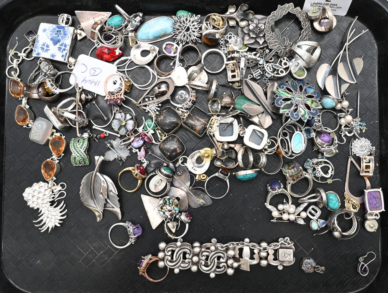 Large Group of Sterling Silver Jewelry: Large Group of Sterling Silver Jewelry to include mostly earrings, pendants, pins/brooches, and rings, total weight 18.8 ozt.