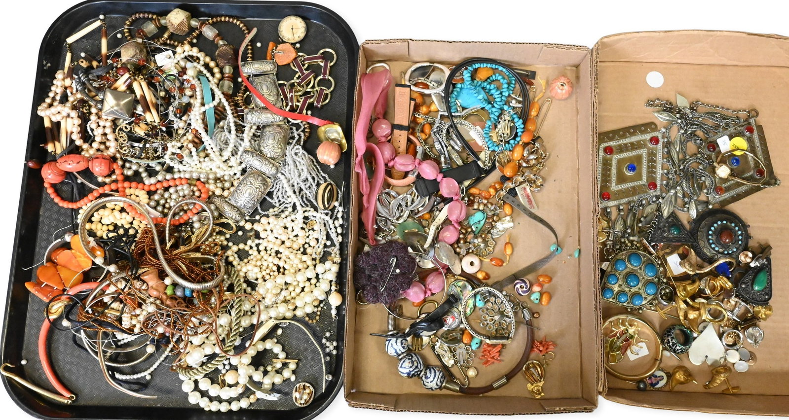 Three Tray Lot of Costume Jewelry: Three Tray Lot of Costume Jewelry to include assorted rings, pendants, some set with turquoise, malachite, and other stones, gilt metal Turkish pieces. Some silver. largest 7 1/4" x 5"