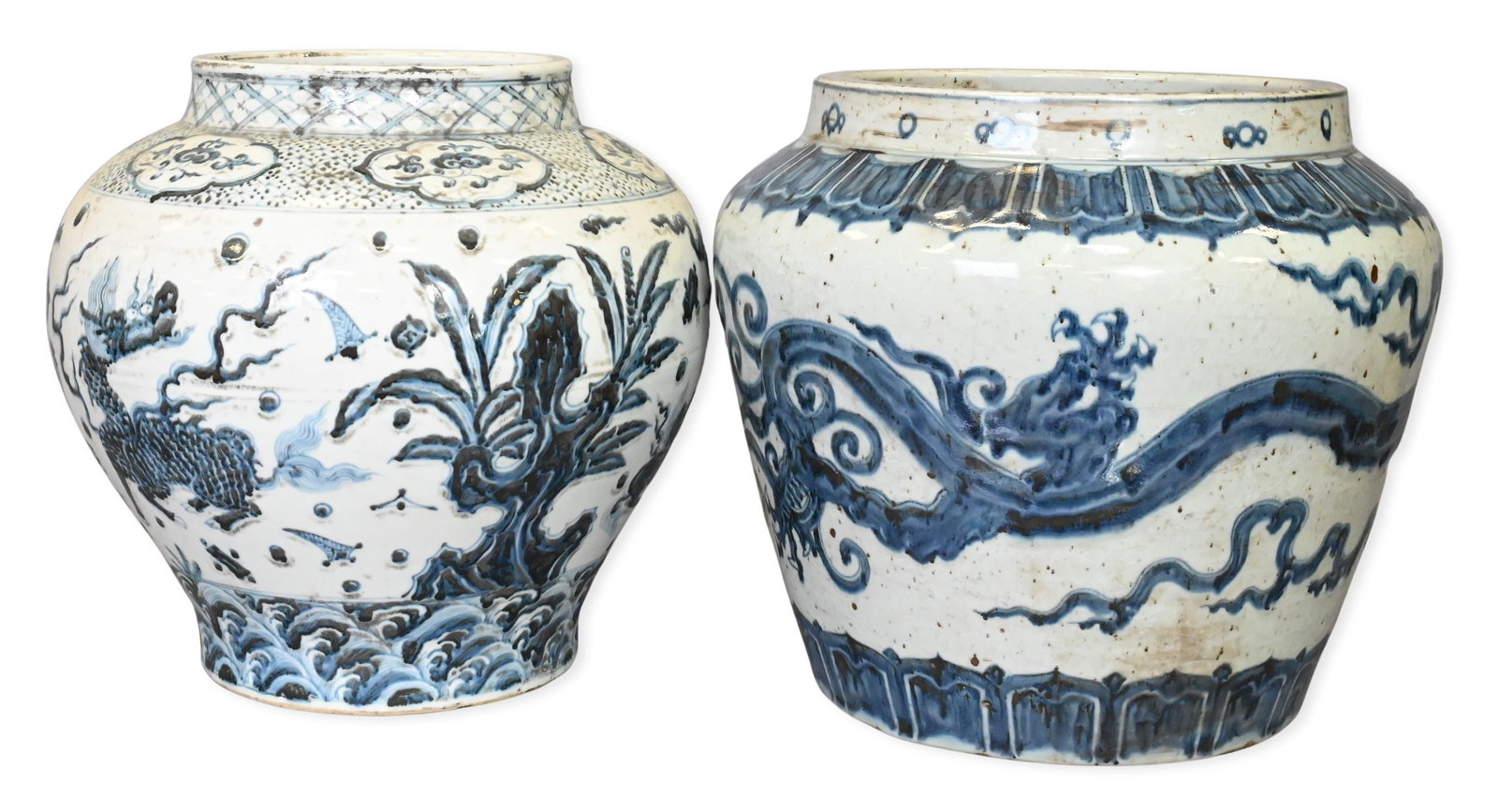Two Large Chinese Blue and White Jars: Two Large Chinese Blue and White Jars to include one example decorated by qilin (Chinese unicorns) amidst floral motifs, height 16 inches, diameter 16 inches, and one Xuande style example decorated by