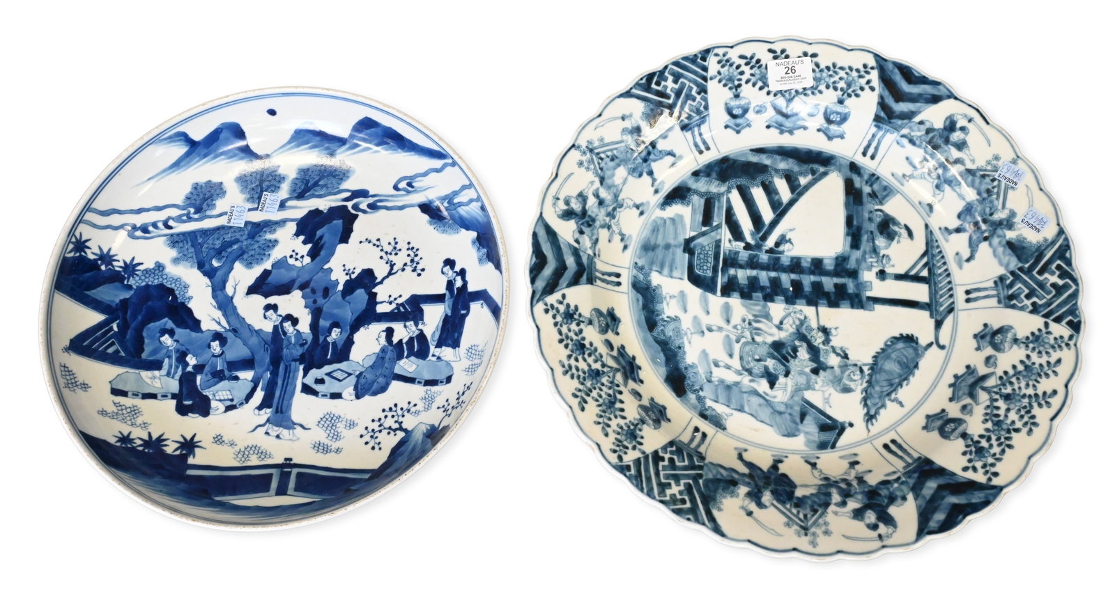 Two Chinese Blue and White Porcelain Chargers: Two Chinese Blue and White Porcelain Chargers to include one kraak style foliate rim example decorated by scholars gathered in a landscape beneath pine trees and scrolling clouds, Kangxi style double 