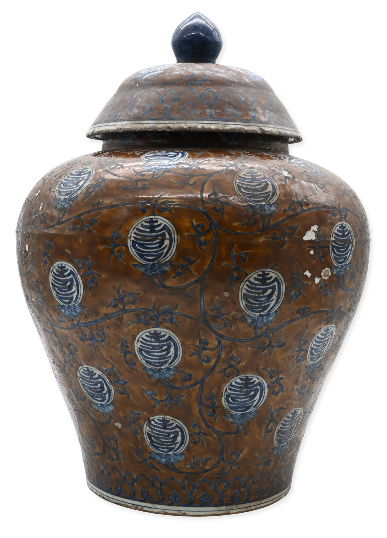 Large Chinese Jiajing Style Porcelain Covered Jar: Large Chinese Jiajing Style Porcelain Covered Jar decorated by blue and white longevity characters reserved on a brown ground amid scrolling floral vines, bearing a double circle Jiajing mark to the u
