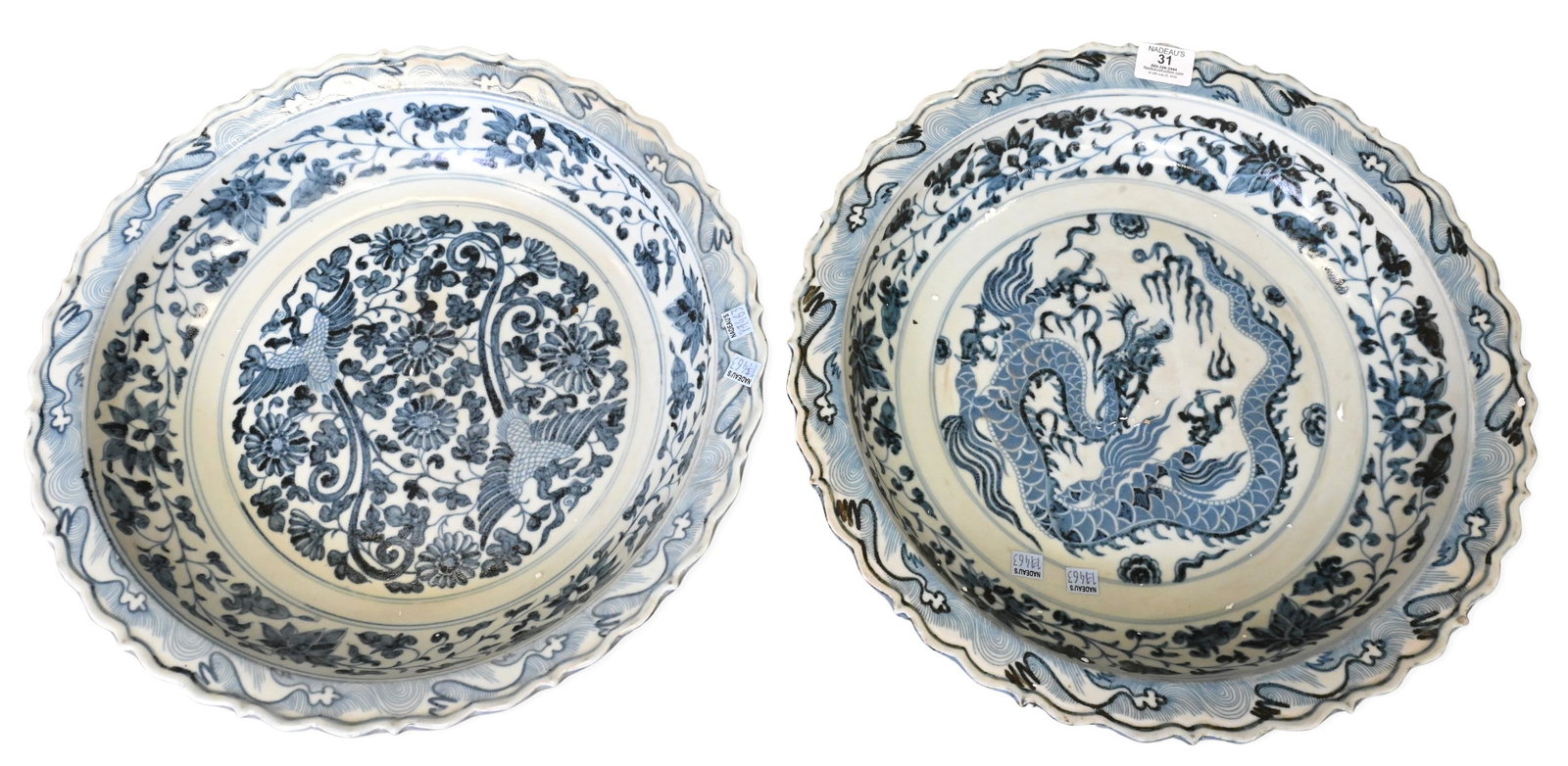 Two Chinese Blue and White Foliate Rim Porcelain Chargers: Two Chinese Blue and White Foliate Rim Porcelain Chargers one decorated by a dragon amidst scrolling clouds and auspicious motifs, the other depicting a phoenix among floral and foliate designs. Each 