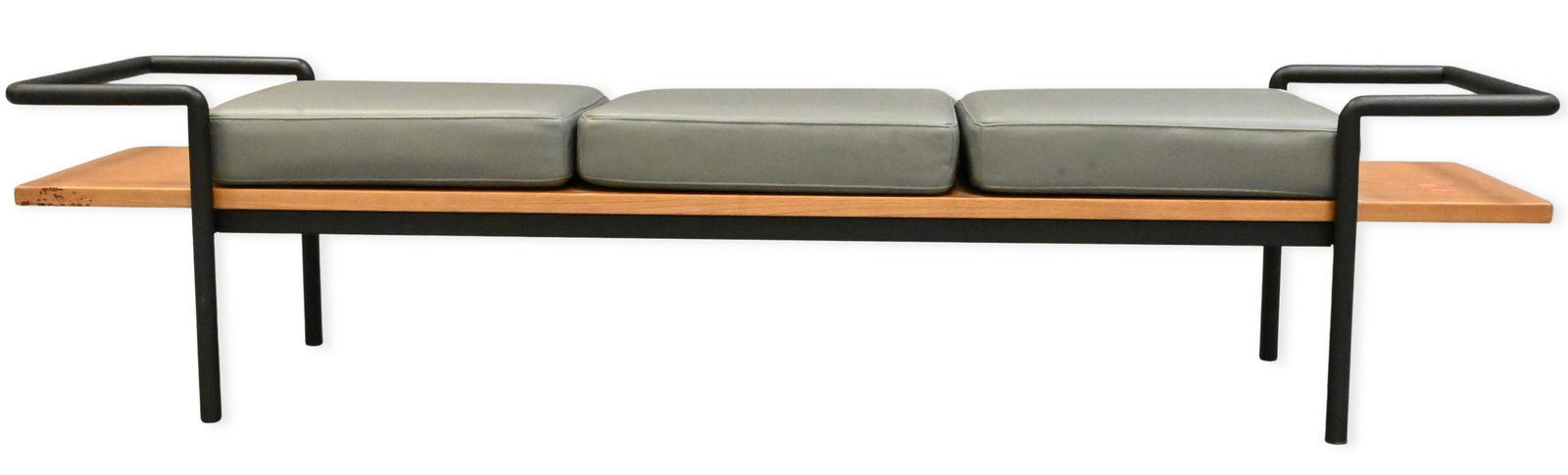 Poltrona Frau T904 Panchina Bench: Poltrona Frau T904 Panchina Bench the minimalist bench featuring a black-finished tubular steel frame supporting a teak-stained ash veneered seat over poplar plywood and three loose cushions. Height 1