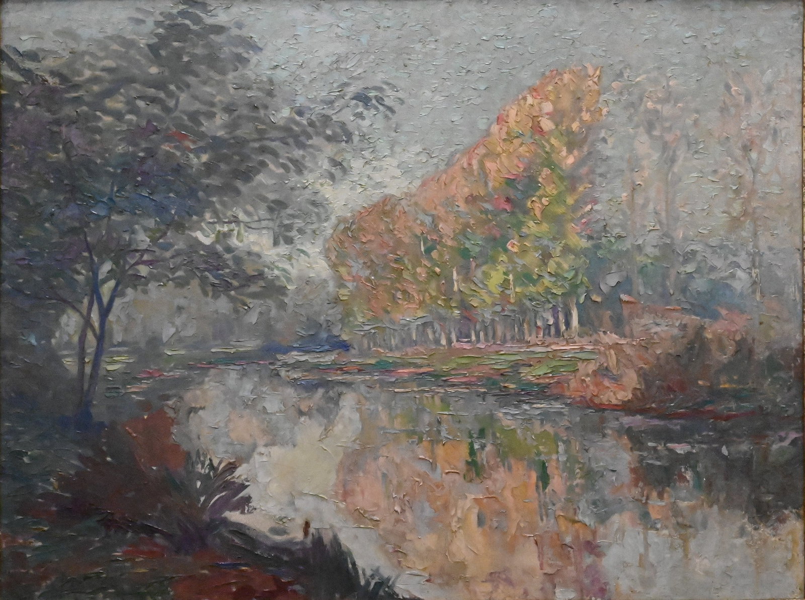 Continental School (19th/20th Century): Continental School (19th/20th Century) "Bords du Morin, Automne" Oil on canvas Impressionist landscape depicting the river Morin in France curving through a wooded setting having trees lining both