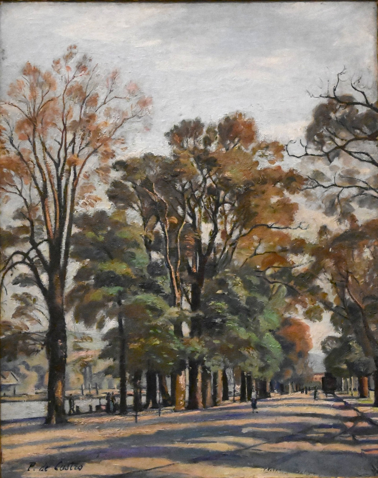 Paul de Castro (British 1882-1939): Paul de Castro (British 1882-1939) "Promenade au Bord de l'Eau" Oil on canvas depicting a tree lined promenade with figures and receding perspective presented in a gilt molded frame with foliate