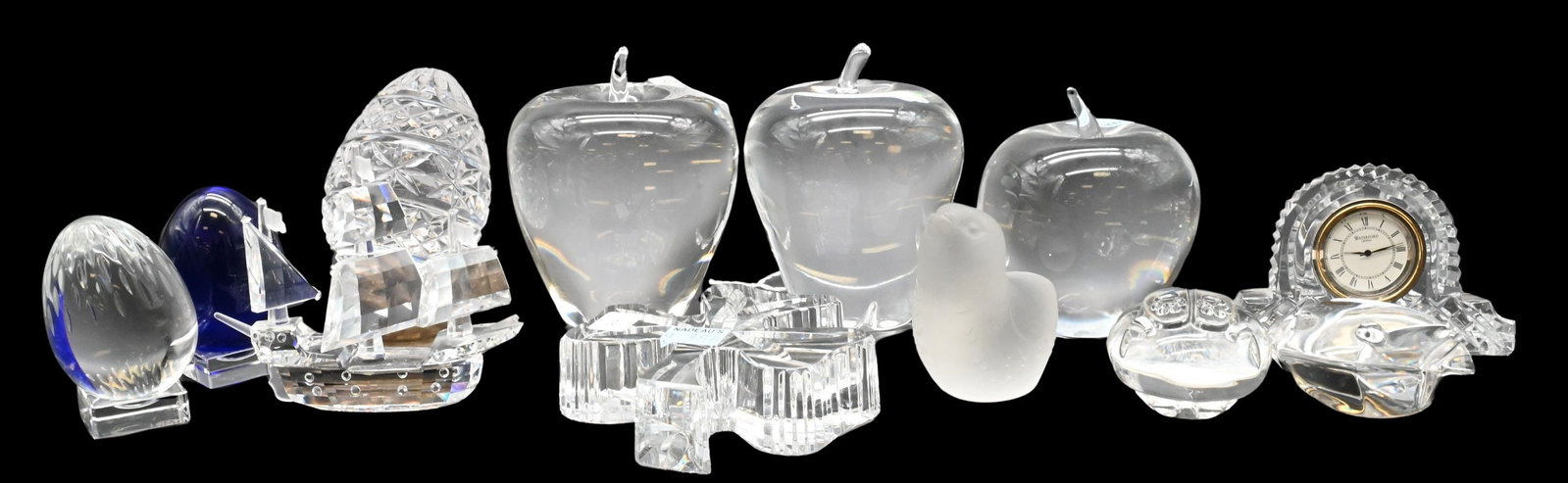 Collection of Fine Designer Crystal Decorative Articles: Collection of Fine Designer Crystal Decorative Articles Including a Tiffany & Co. glass apple paperweight, two Steuben glass apple paperweights, a Steuben frog hand cooler, a Val Saint Lambert crystal