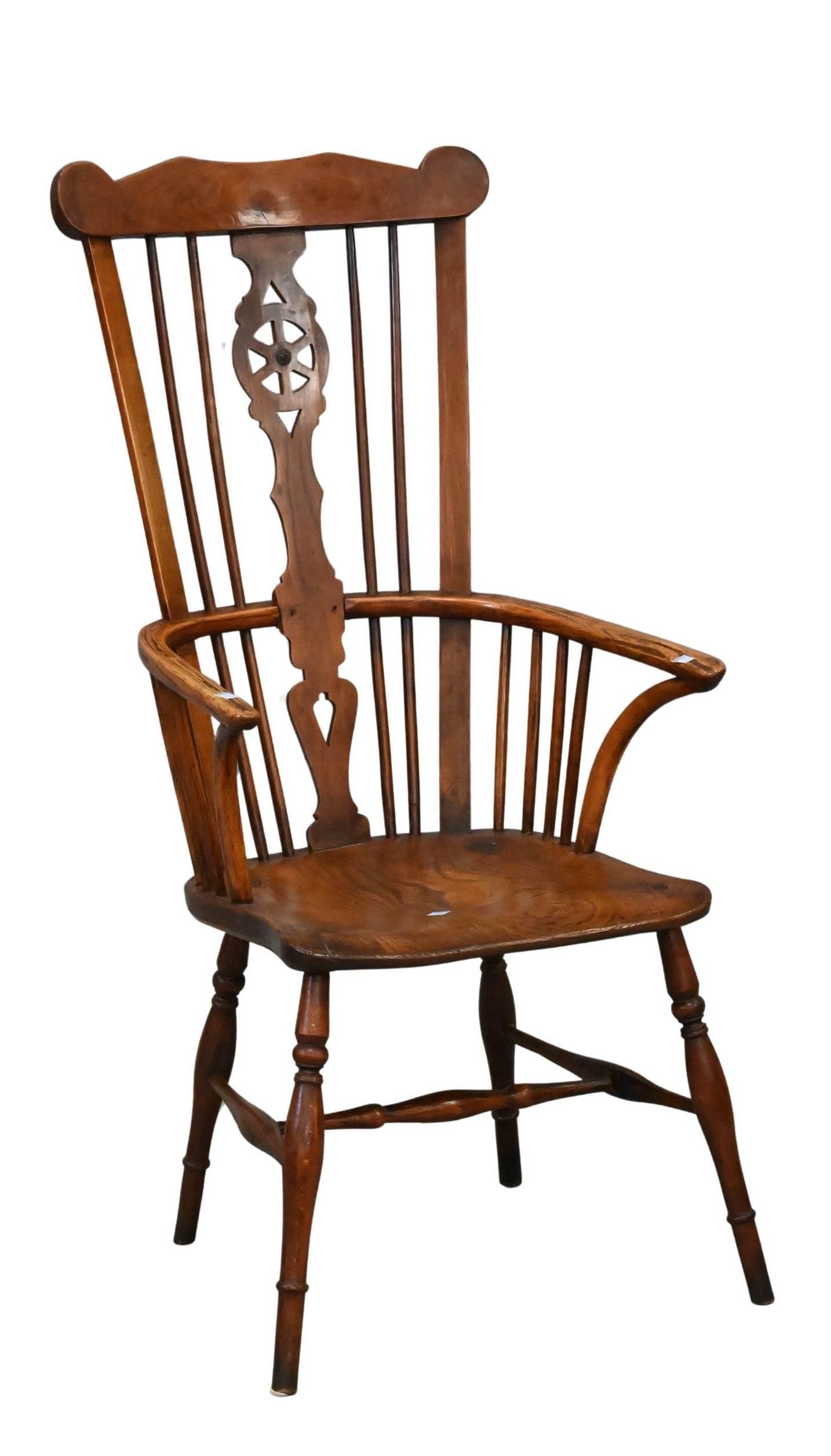 English Comb Back Windsor Arm Chair: English Comb Back Windsor Arm Chair having pierced wheel splat back over turned legs height 47 inches, width 22 inches Provenance: Part of a large Western art collection from Massachusetts