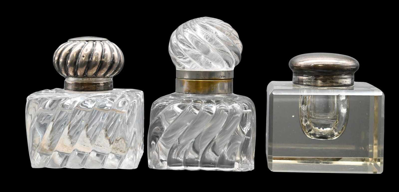 Three Inkwells: Three Inkwells two with sterling silver tops, two attributed to Baccarat height 6 inches, 5 inches, 4 inches, sizes 3 1/2" x 3 1/2", 4" x 4", 4" x 4"