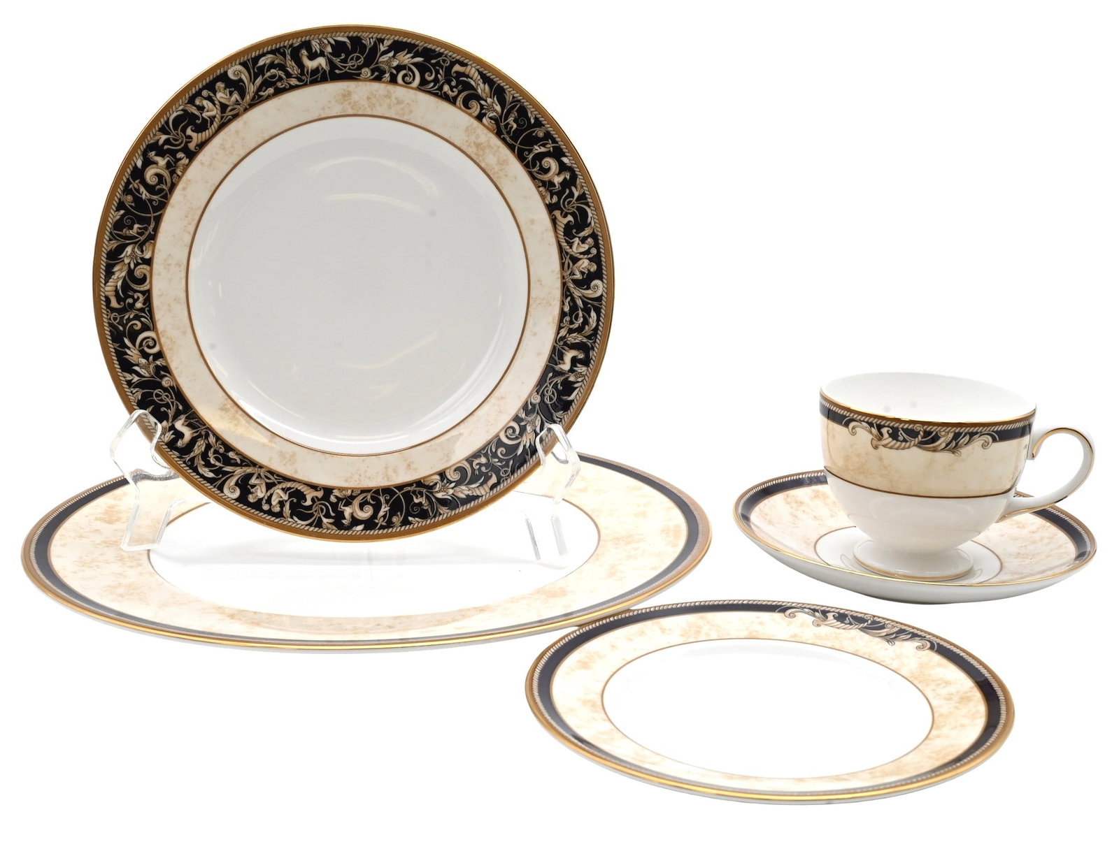 63 Piece Set of Wedgwood "Cornucopia" Dinner Service: 63 Piece Set of Wedgwood "Cornucopia" Dinner Service having complete service for 12, to include 12 dinner plates, 12 salad plates, 12 bread and butter plates, 12 tea cups, 12 saucers, 1 oval platter, 
