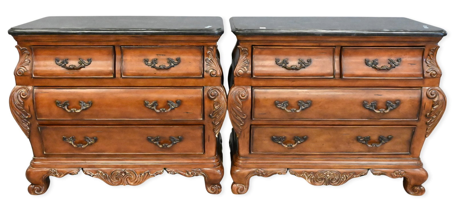 Pair of Thomasville "Chateau Provence" Stonetop Nightstands: Pair of Thomasville "Chateau Provence" Stonetop Nightstands each having a stone top above a case fitted with four drawers, carved acanthus leaf decoration and raised on short scroll feet. Signed to in