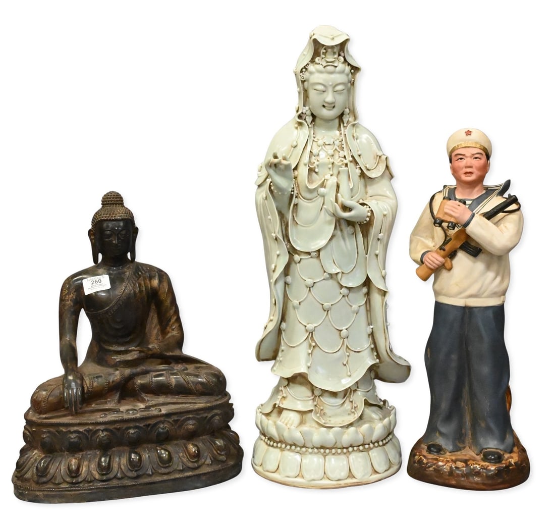 Three Asian Figural Articles: Three Asian Figural Articles to include one celadon glazed porcelain figure of Guanyin, height 24 1/2 inches, one famille rose porcelain figure of a naval soldier, height 19 1/2 inches, and one gilt b