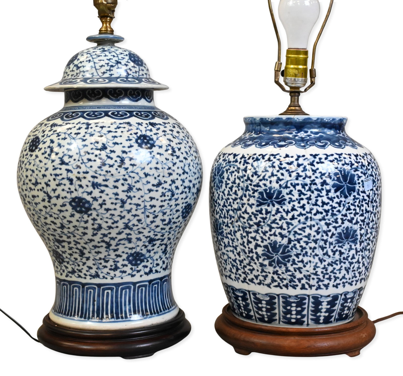 Two Chinese Blue and White Porcelain Ginger Jar Lamps: Two Chinese Blue and White Porcelain Ginger Jar Lamps baluster-form jars decorated with dense scrolling floral vines and stylized blossoms, one having domed cover, height 16 inches, both mounted as ta