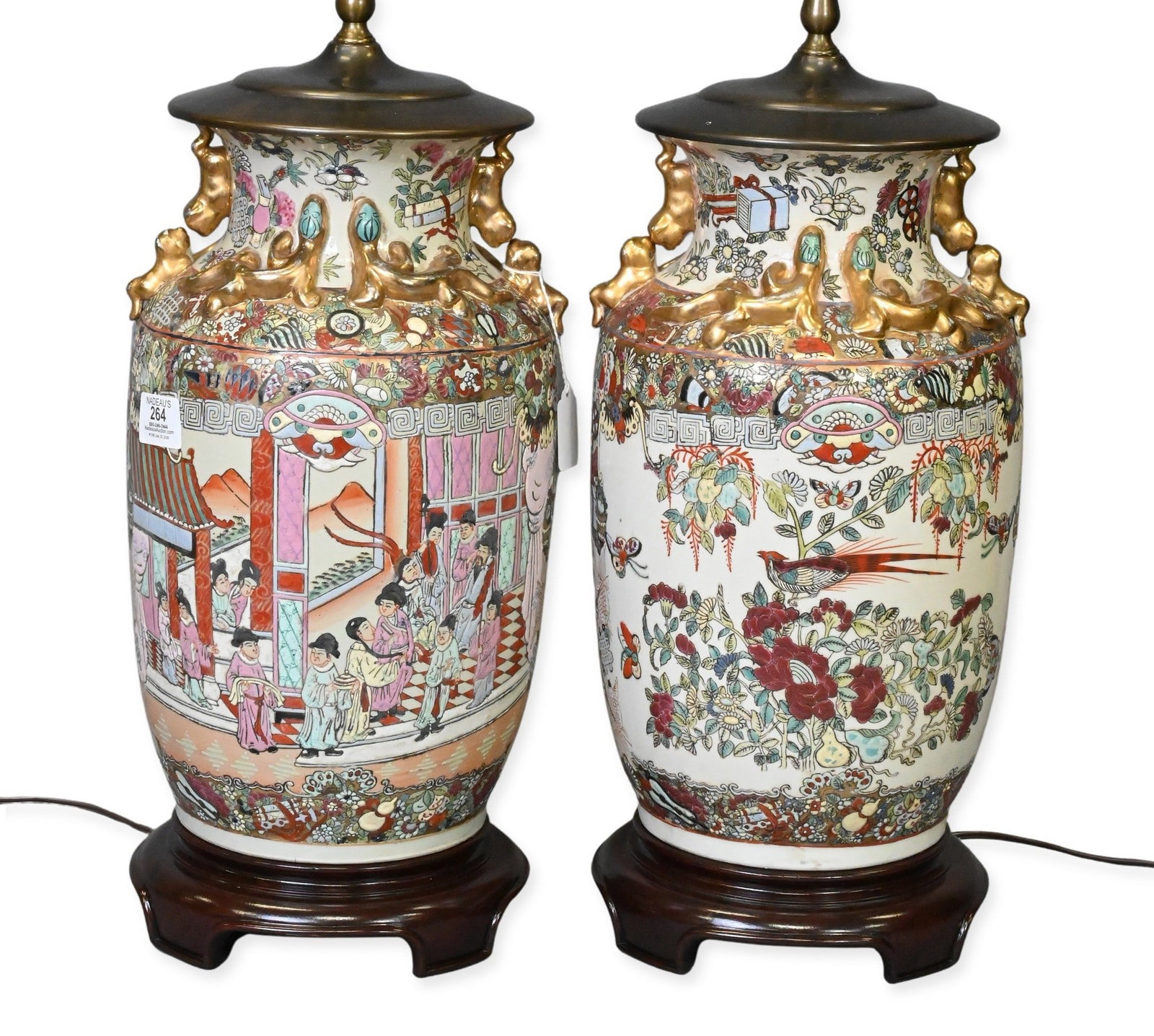 Pair of Chinese Famille Rose Export Style Porcelain Table Lamps: Pair of Chinese Famille Rose Export Style Porcelain Table Lamps of baluster form, famille rose-style floral, butterfly, and auspicious object motifs, accented by gilt molded dragons height overall 31 
