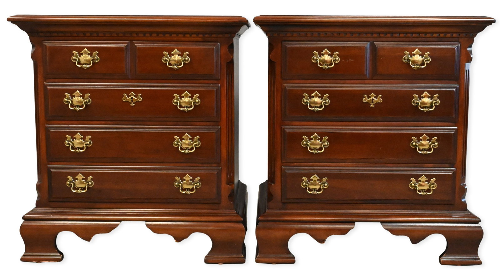 Pair of Lexington Cherry Nightstands: Pair of Lexington Cherry Nightstands each having three dovetailed drawers, brass hardware, and molded tops height 29 inches, width 27 inches, depth 17 inches