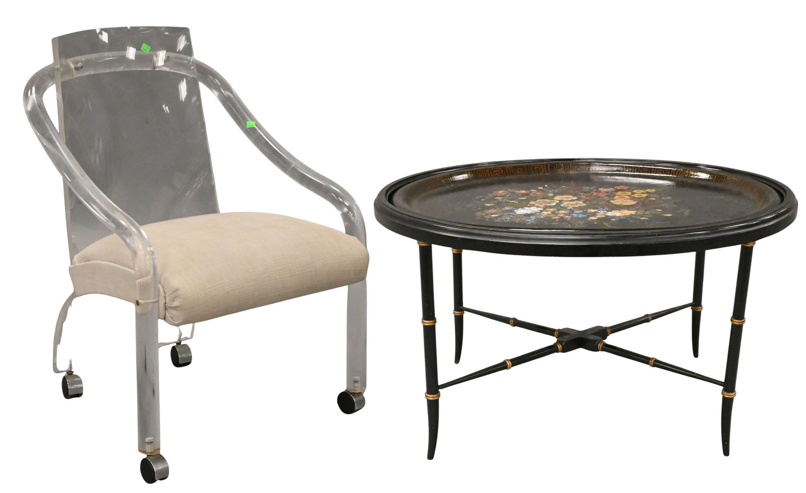 Two Piece Lot: Two Piece Lot to include Black Painted Floral Tray Table Oval tray top having gilt and polychrome floral decoration, raised on crossbar faux bamboo supports height 18 inches, top 26" x 32" Mid