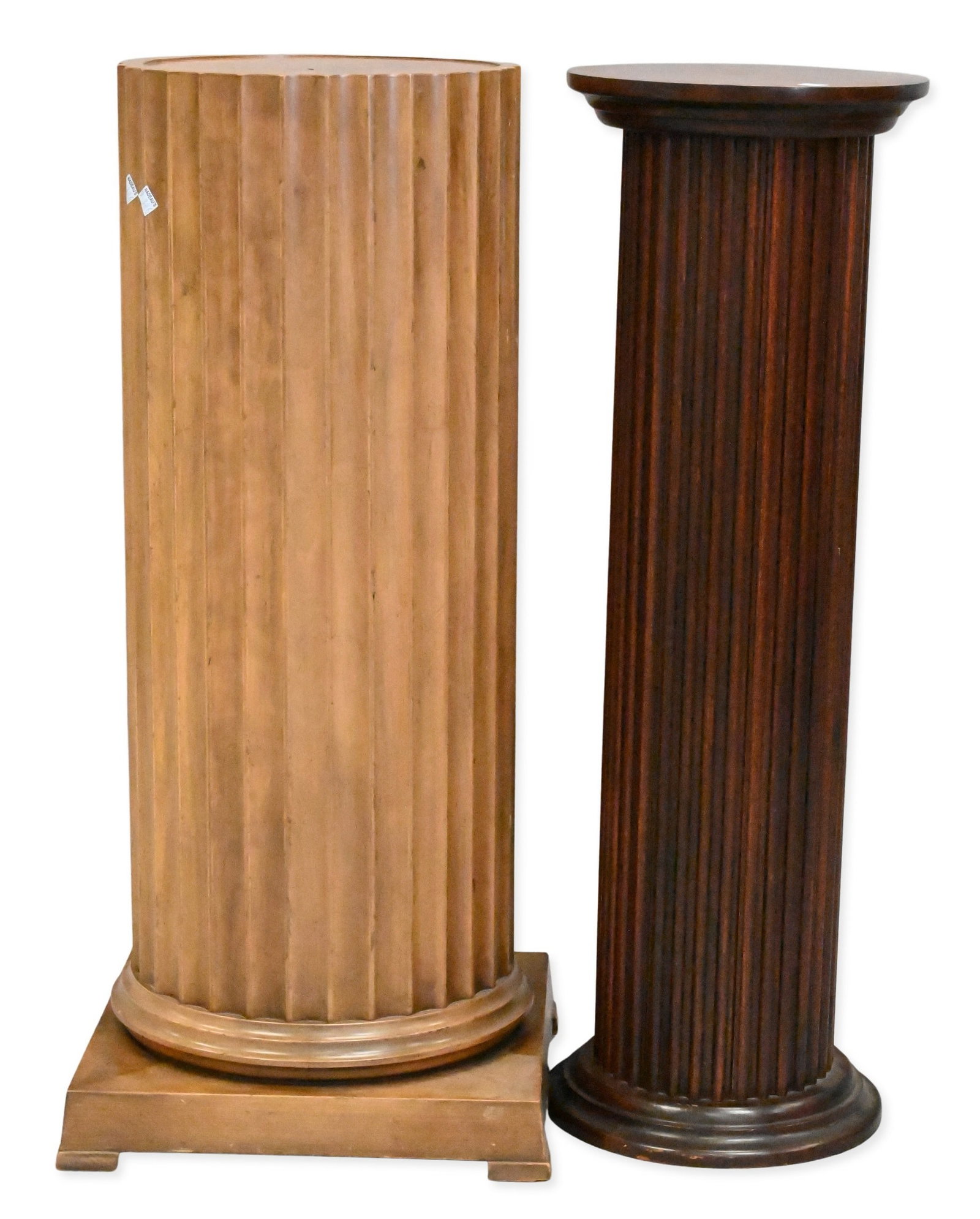 Two Wood Fluted Pedestals: Two Wood Fluted Pedestals height 36 1/2 inches and 36 inches, diameter 13 inches and 12 inches