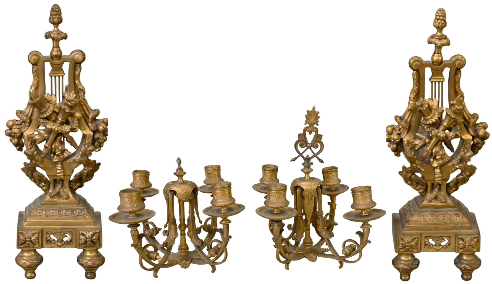 Pair of Louis XVI Style Gilt Bronze Andirons and Candelabra Tops: Pair of Louis XVI Style Gilt Bronze Andirons and Candelabra Tops lyre-form standards surmounted by pinecone finials, featuring crossed flaming torches and draped garlands, raised on stepped bases heig