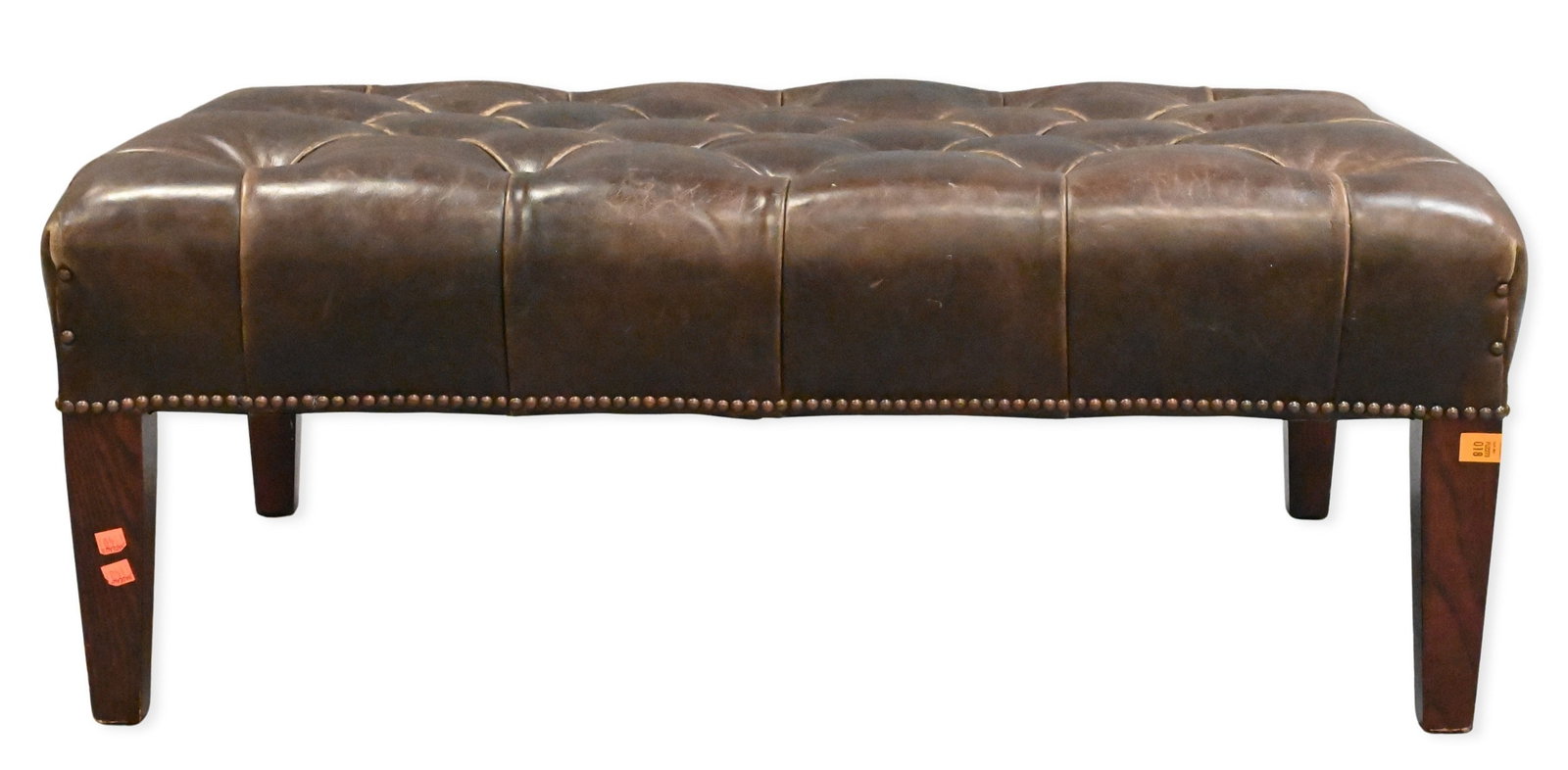 George Smith Tufted Leather Ottoman: George Smith Tufted Leather Ottoman signed George Smith on bottom, some wear to leather height 15 inches, top 30" x 41"