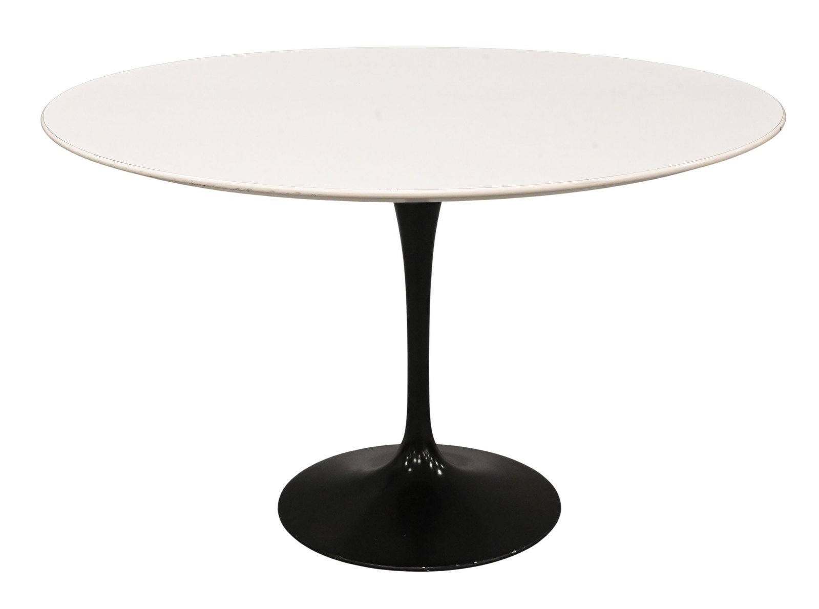 Eero Saarinen for Knoll Tulip Table: Eero Saarinen for Knoll Tulip Table white laminate over wood round top, set on black enameled aluminum base height 29 inches, diameter 47 inches Reference: Current comparable examples retail for appro