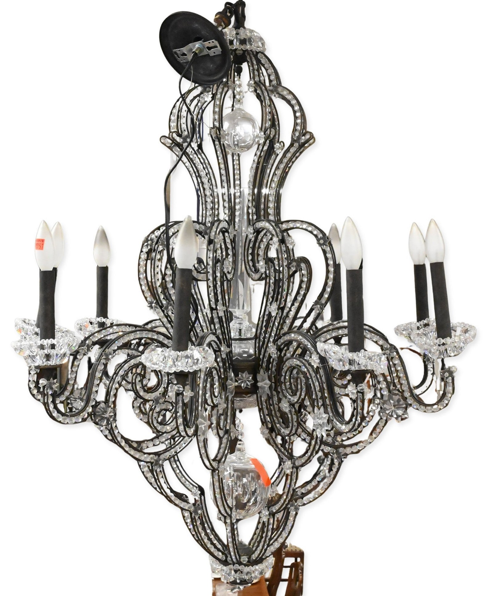 Schonbek "Scheherazade" Nine Light Chandelier: Schonbek "Scheherazade" Nine Light Chandelier featuring black metal scrolling arms wired with clear Swarovski Elements crystal, hand blown hanging spheres and hand cut bohemian crystal height 40