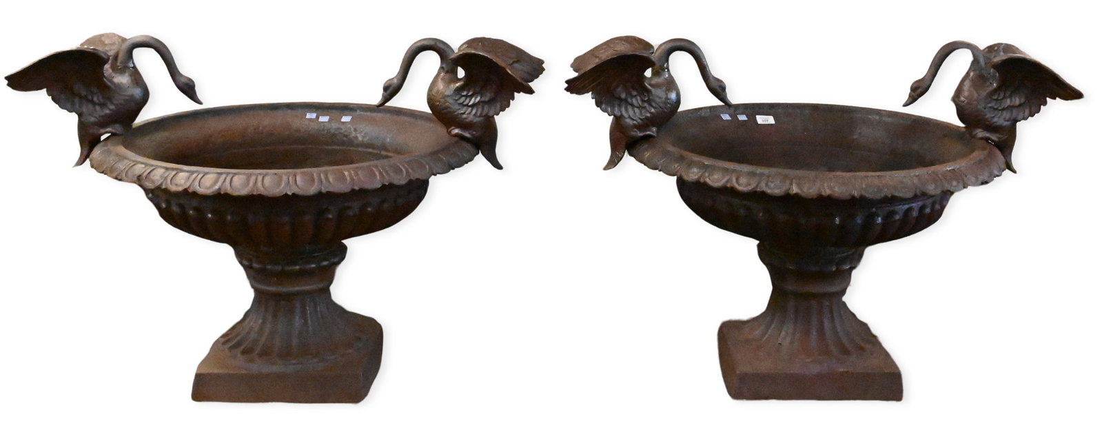 Pair Iron Outdoor Urns: Pair Iron Outdoor Urns mounted with swans height 28" (total), diameter 40" (total)