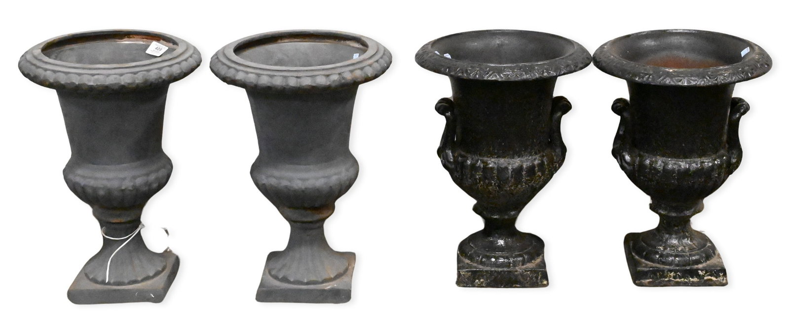 Two Pairs of Small Iron Outdoor Urns: Two Pairs of Small Iron Outdoor Urns one gray pair and one black pair height 17" and 16"
