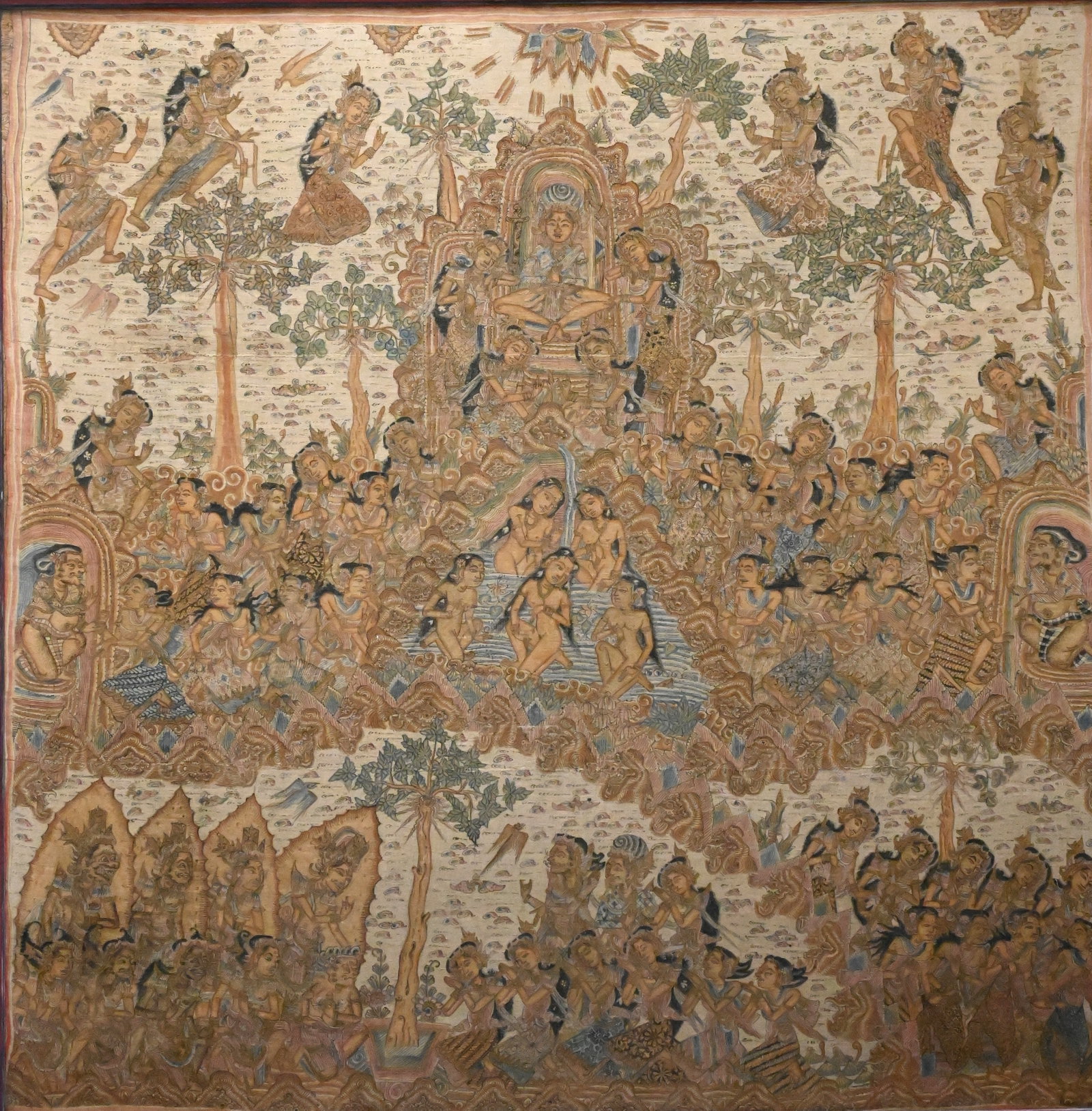Large Balinese Kamasan Style Painted Tapestry: Large Balinese Kamasan Style Painted Tapestry Hand-painted ceremonial cloth depicting a central deity enthroned among attendants, celestial figures, and a narrative scene, mounted in a carved and