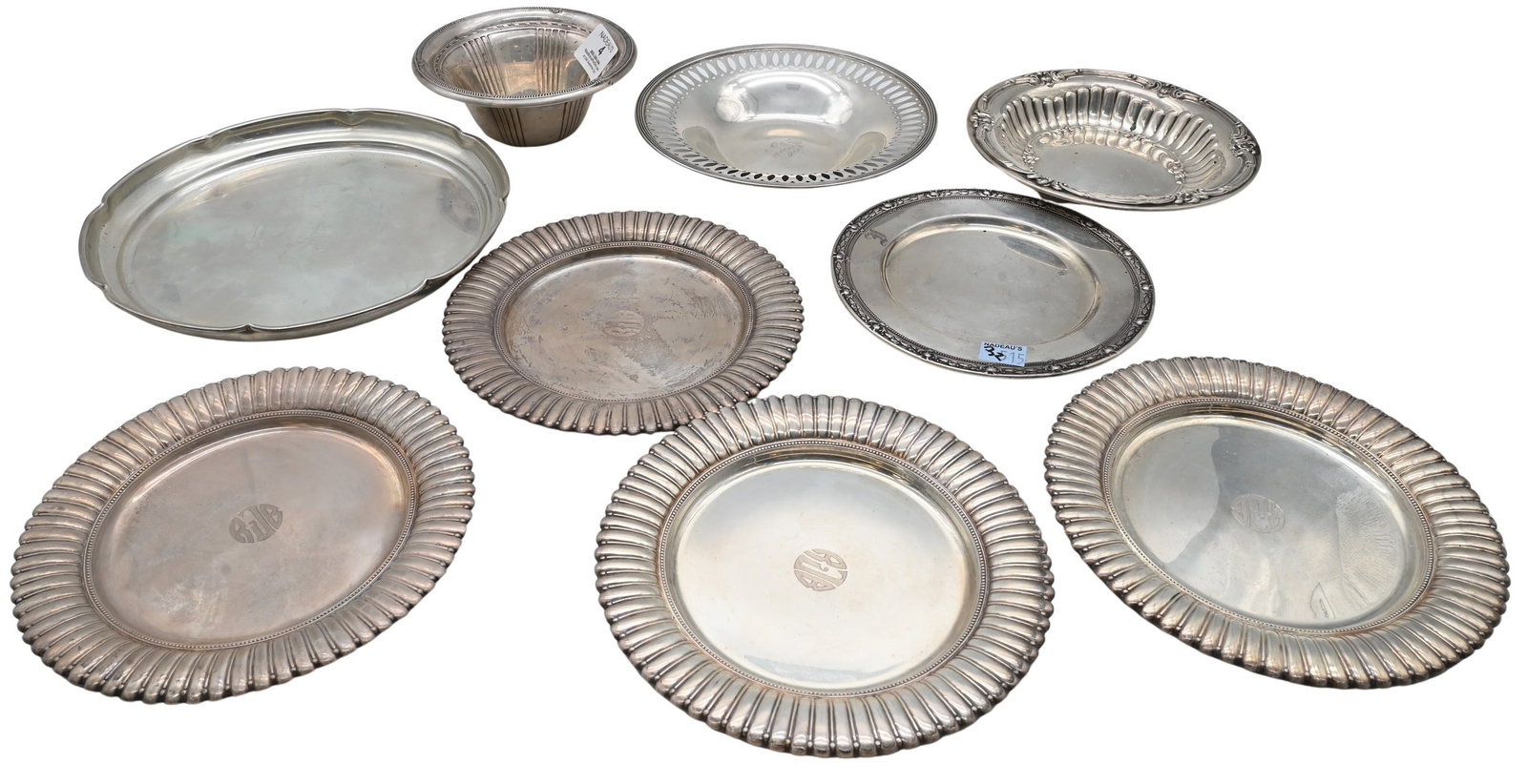 Nine Piece Sterling Silver Group: Nine Piece Sterling Silver Group to include set of four Wallace 6 1/2 inch bread plates, Gorham bowl, and four other trays of various diameters largest diameter 8 inches, 38.2 troy ounces