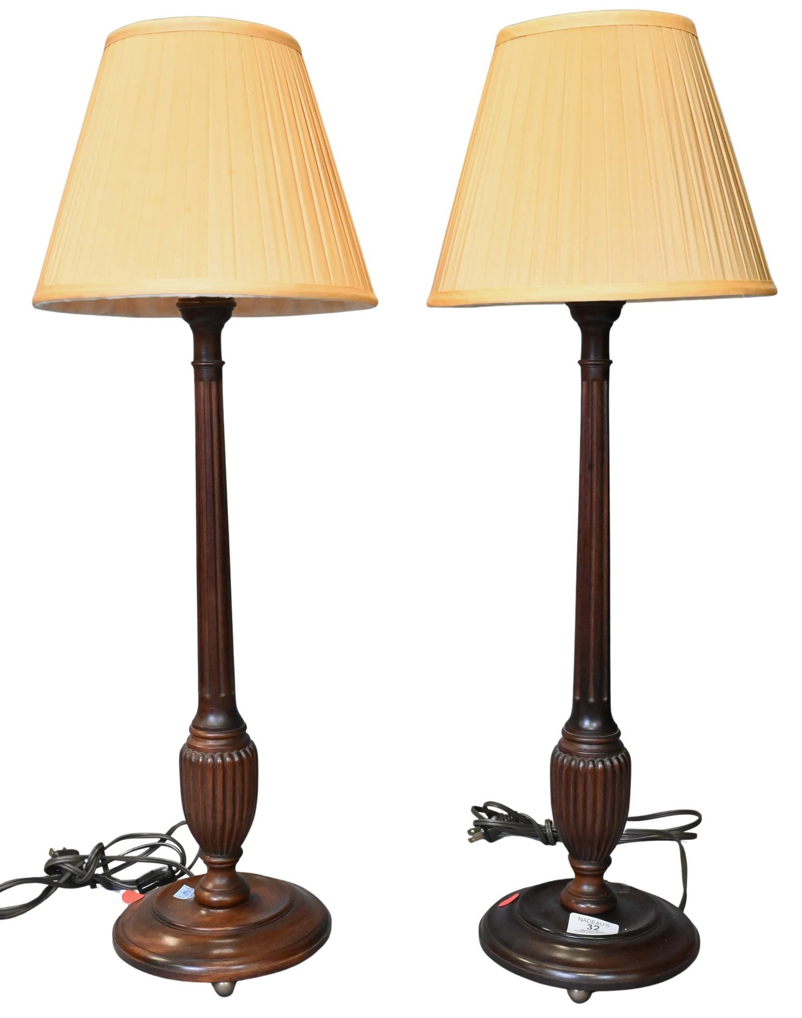 Pair of Regency Style Column Form Table Lamps: Pair of Regency Style Column Form Table Lamps Turned and reeded wooden standards raised on circular molded bases, electrified for single light and custom shades, raised on three ball from feet height 