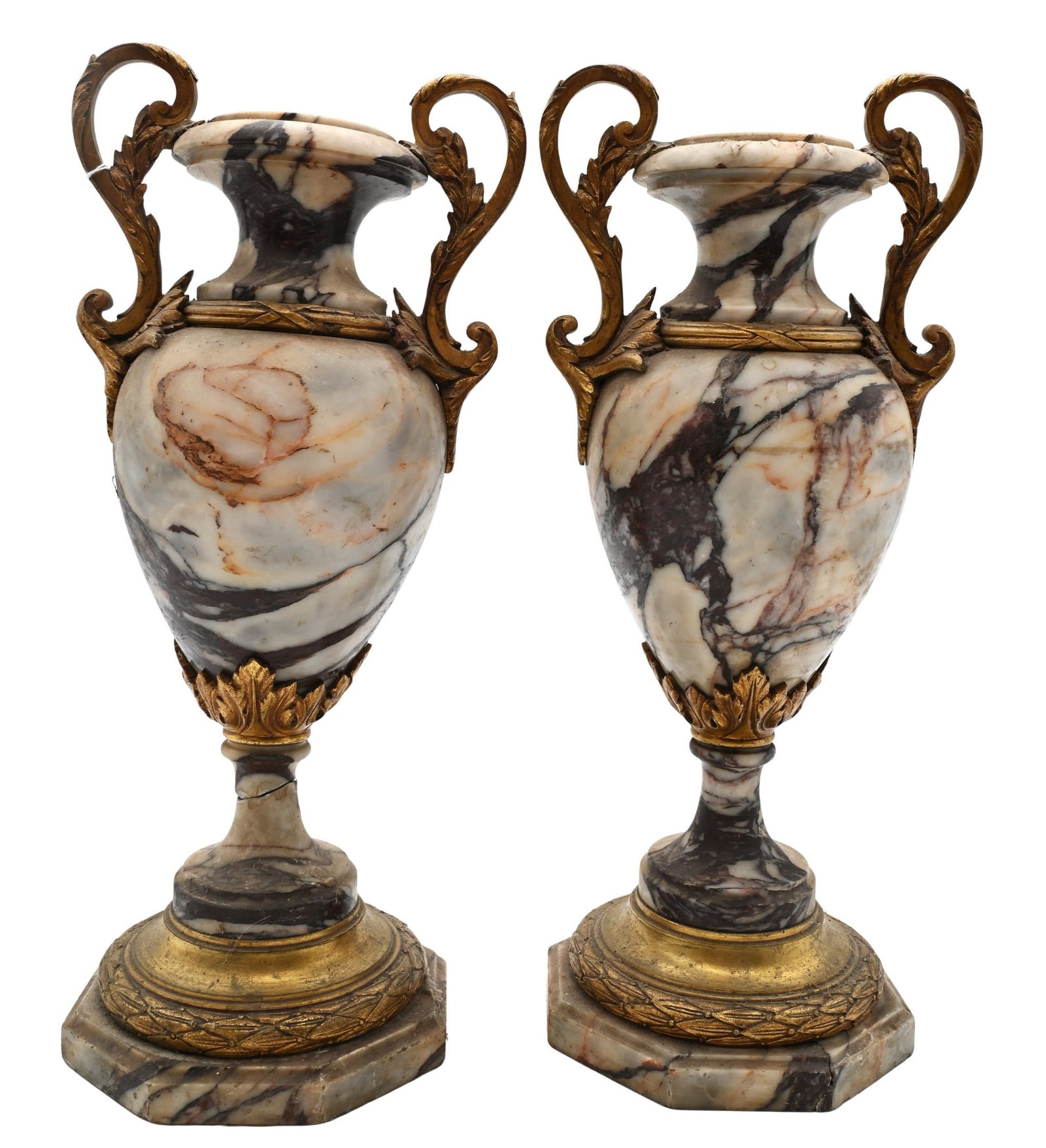 Pair of Marble and Ormolu Mounted Urns: Pair of Marble and Ormolu Mounted Urns Urn-form marble decorative objects having variegated white and brown marble bodies, scrolling ormolu handles, and octagonal marble plinths accented by ormolu
