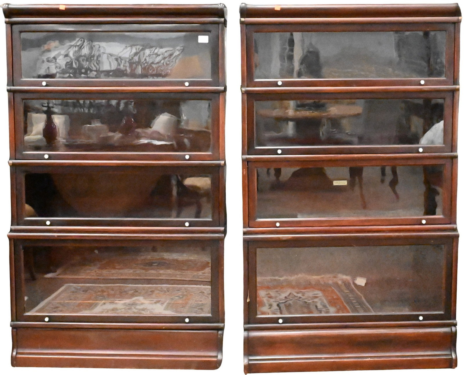 Pair of Globe Wernicke Barrister Bookcases: Pair of Globe Wernicke Barrister Bookcases in four sections, each having hinged glass doors, Globe Wernicke tag mounted to interior of one section height 57 1/2 inches, width 34 inches, depth 10 1/2