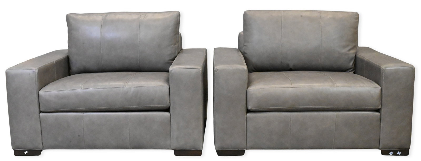 Pair of Ethan Allen Leather Upholstered "Spencer Track-Arm" Chair & a Halves: Pair of Ethan Allen Leather Upholstered "Spencer Track-Arm" Chair & a Halves retail price $3,999 per chair height 29 inches, width 50 inches, depth 38 inches