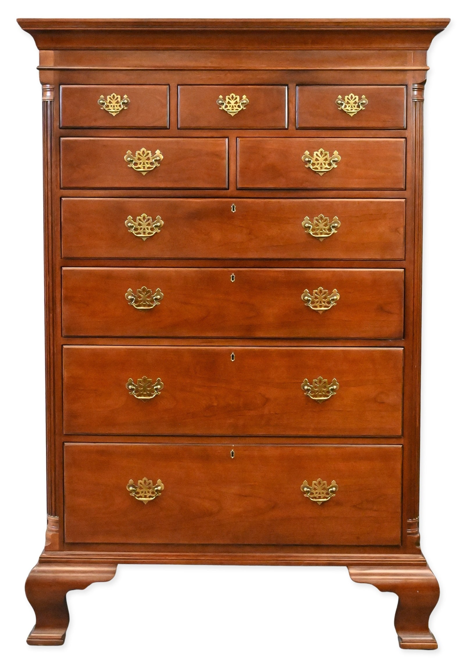 Henredon Pennsylvania Style Cherry Tall Chest: Henredon Pennsylvania Style Cherry Tall Chest having molded cornice over nine drawers, brass Chippendale style handles, sitting on bracket feet height 65 1/2 inches, top 20 1/2" x 44"