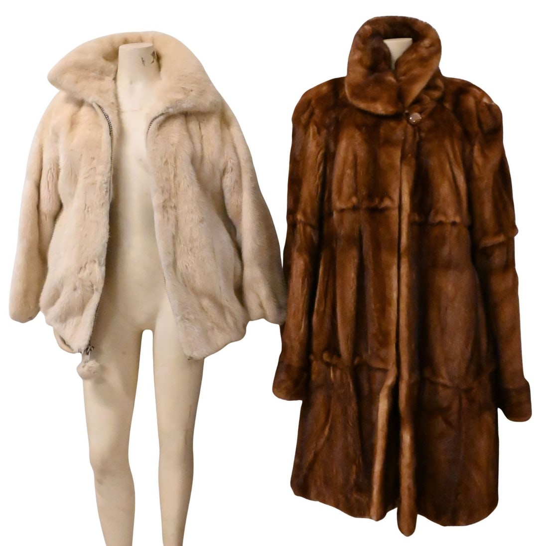 Group of Two Fur Coats: Group of Two Fur Coats one having white possibly mink fur, wide collar, and zipper; the other is Chachtchicm multi-brown color fur having wide collar and clips to close