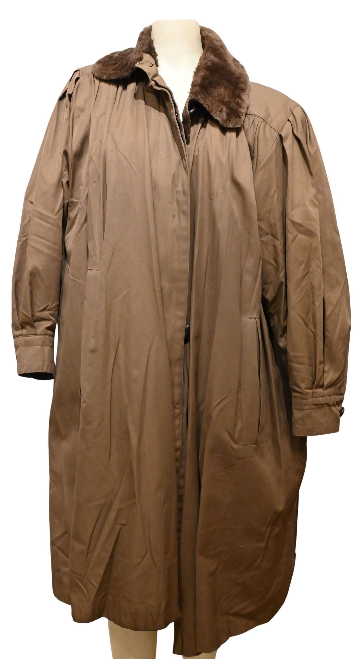 Yves Saint Laurent Women's Overcoat: Yves Saint Laurent Women's Overcoat having a brown fur lining and light brown fur-trimmed collar size 40, tag in pocket