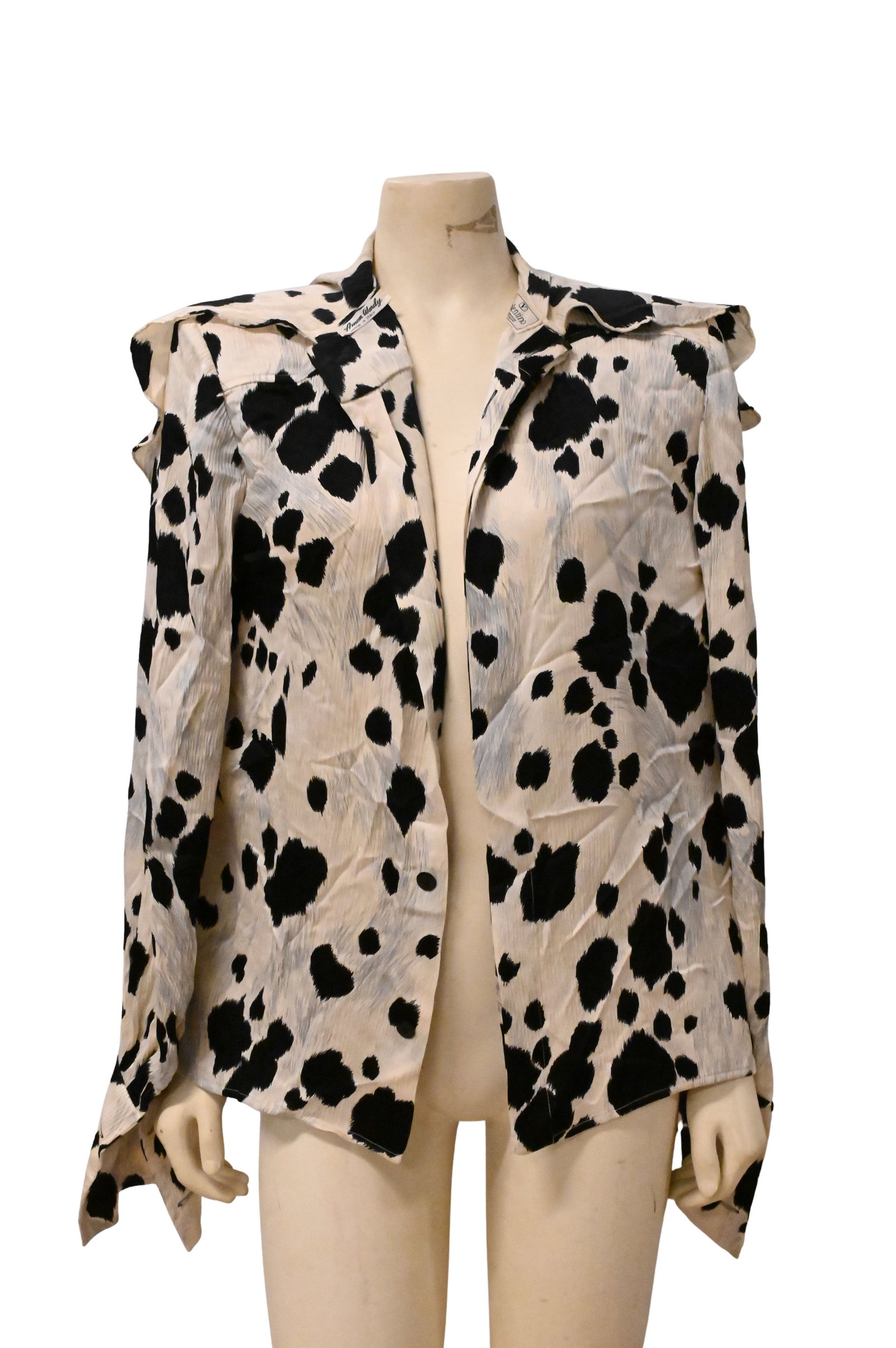 Valentino Silk Cow Print Blouse: Valentino Silk Cow Print Blouse having long sleeves, button closure, and paddle shoulders size 10