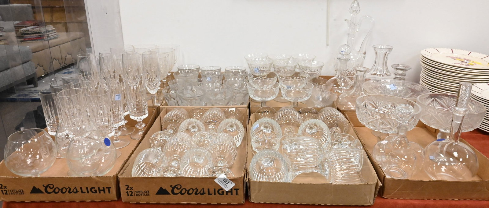 Collection of Glass and Crystal Stemware: Collection of Glass and Crystal Stemware to include four Gorham "Lady Anne" champagne flutes; Lenox crystal stemware; Fostoria Coin pattern tumblers; Saint-Louis ewer carafe and stopper, William Yeowa