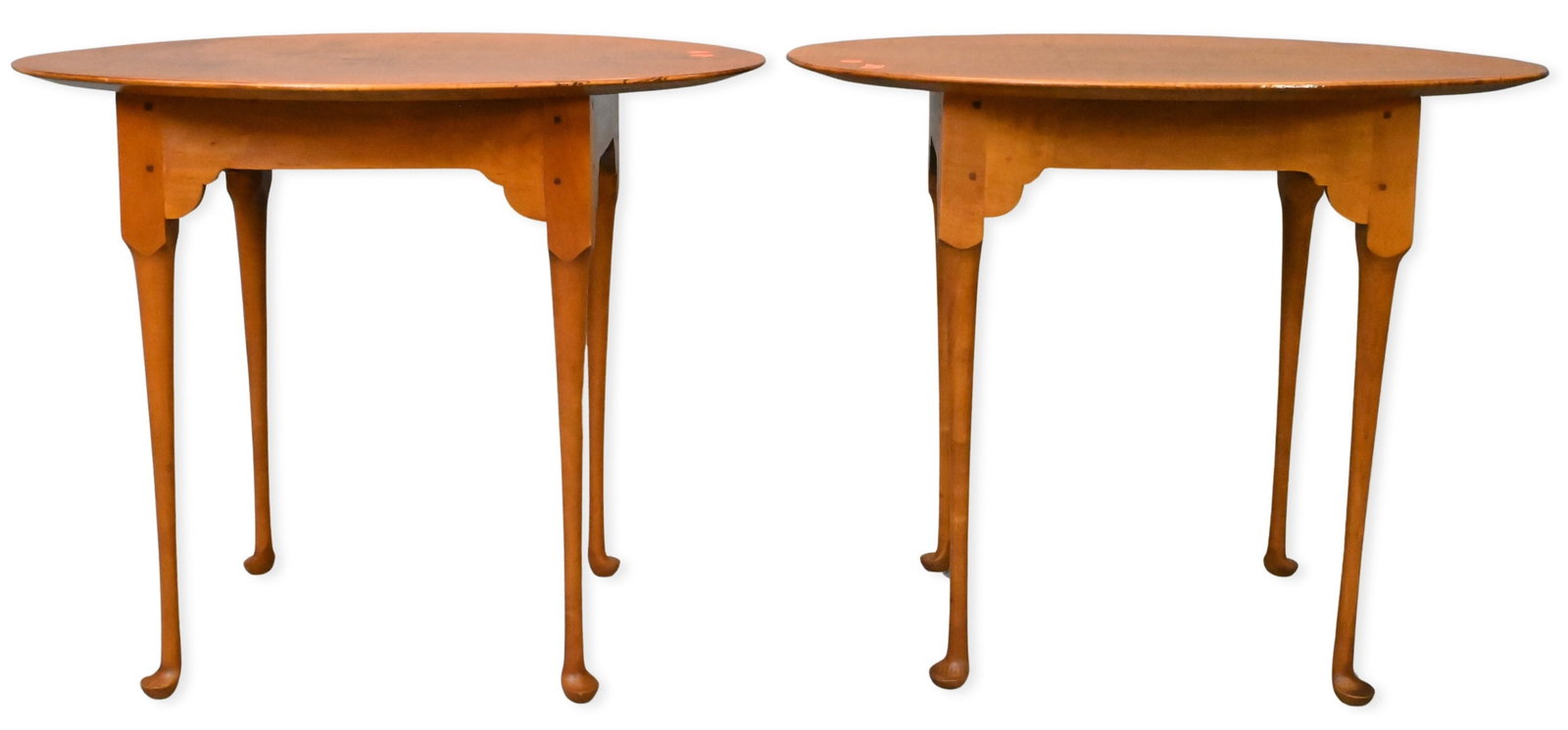 Pair of Benchmade Queen Anne Style Tiger Maple Tea / End Tables: Pair of Benchmade Queen Anne Style Tiger Maple Tea / End Tables each having oval top set on shaped base ending in pad feet, having pinned construction height 26 inches, top 25" x 30 1/4"