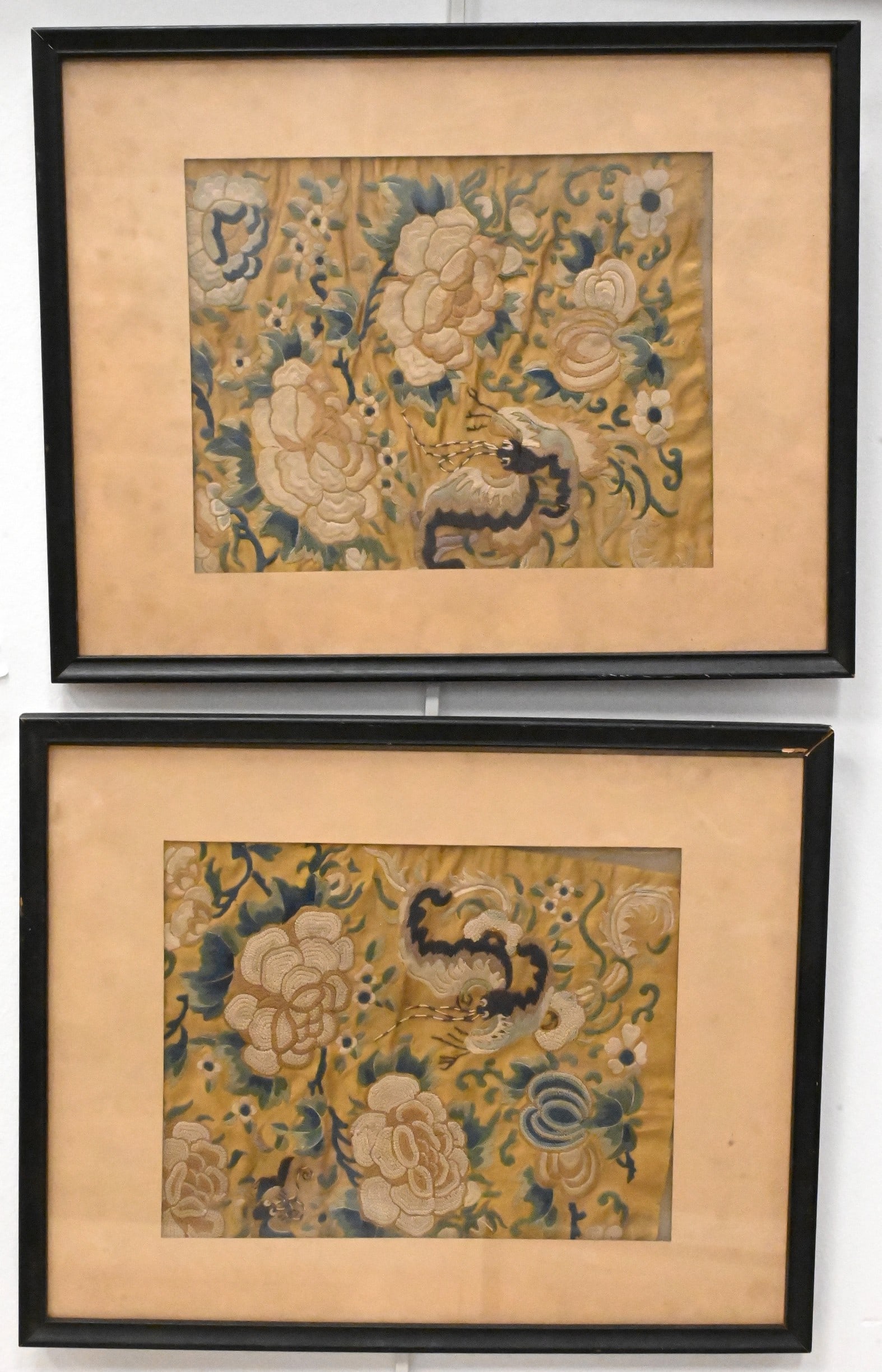 Pair of Chinese Imperial Yellow Rank Badges: Pair of Chinese Imperial Yellow Rank Badges Embroidered silk panels depicting peony blossoms and butterflies amid flowering branches against an imperial yellow ground 9 1/2" x 7 1/2" sight