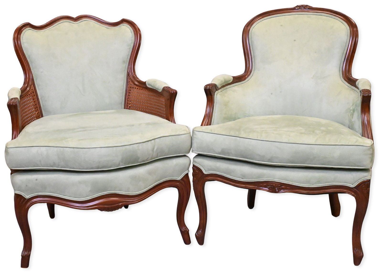 Near Pair of Louis XV Style Bergeres: Near Pair of Louis XV Style Bergeres each having pale green upholstery, one having caned sides, each set on cabriole legs height 36 1/2 inches, length 27 1/2 inches, width 25 1/2 inches
