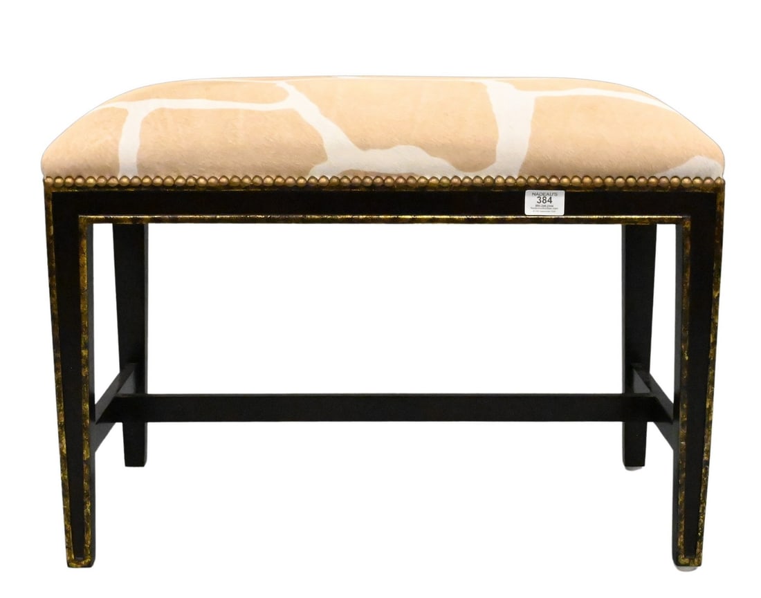 Oly Studio "Hilary" Bench: Oly Studio "Hilary" Bench upholstered in giraffe-pattern cowhide, raised on parcel-gilt and black painted wood legs joined by an H-stretcher height 19 inches, length 26 inches, depth 16 inches